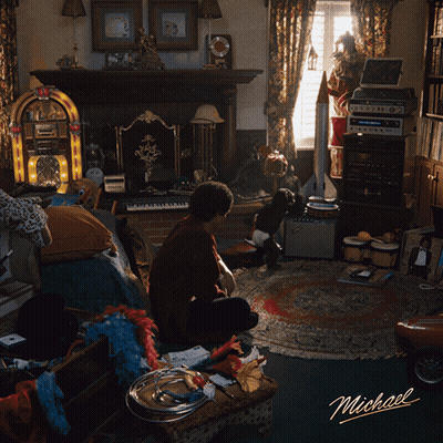 Man Sitting On Couch With Name Michael GIF