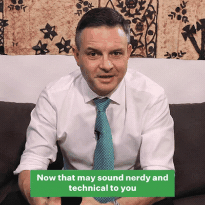Man Sitting On Couch With Now Sign GIF