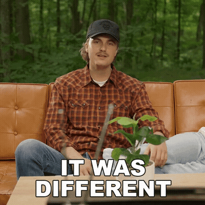 Man Sitting On Couch With Plant Saying It Was Different GIF