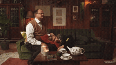 Man Sitting On Couch With Woman On Lap Cinegramma.de GIF