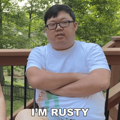 Man Sitting On Deck With Arms Crossed Saying I'm Rusty GIF