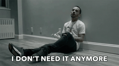 Man Sitting On Floor Saying I Don't Need It Anymore GIF