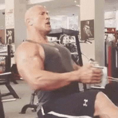 Man Sitting On Gym Bench Doing Machine Exercises GIF