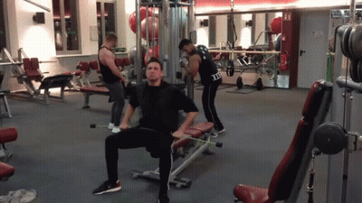 Man Sitting On Gym Bench In I Love You Shirt GIF