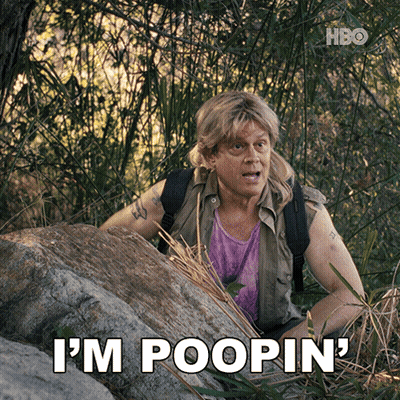 Man Sitting On Rock Saying I'm Poopin GIF
