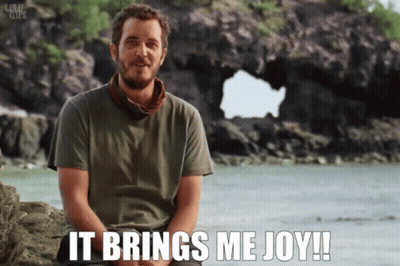 Man Sitting On Rock Saying It Brings Me Joy GIF