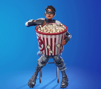 Man Sitting On Stool Holding Popcorn Bucket GIF