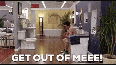 Man Sitting On Stool In Bathroom GIF