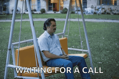Man Sitting On Swing Waiting For A Call GIF