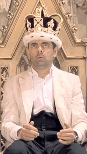 Man Sitting On Throne Wearing King Crown GIF