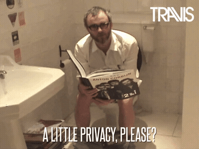 Man Sitting On Toilet Holding Book GIF