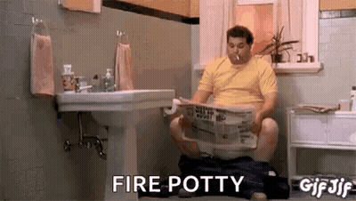 Man Sitting On Toilet Reading Newspaper Smoking Cigarette GIF