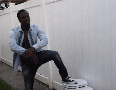 Man Sitting On Toilet With Leg Up GIF