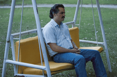 Man Sitting On Yellow Swing GIF