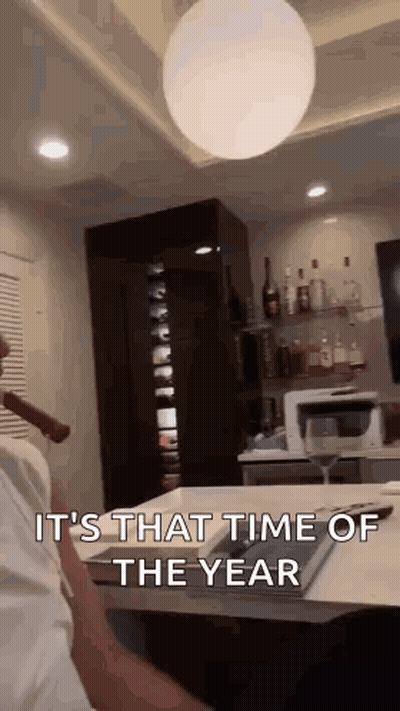Man Sitting Smoking Cigar In Living Room GIF