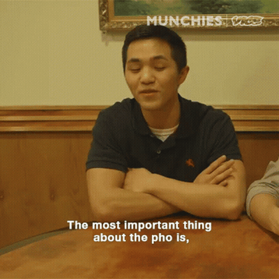 Man Sitting With Arms Crossed Saying The Most Important Thing About The Pho Is GIF