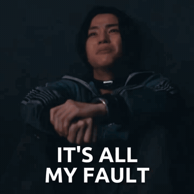 Man Sitting With Fault Words GIF