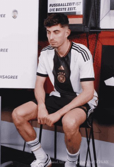 Man Sitting With Fussballzeit Ist Die Beste Zeit Sign GIF
