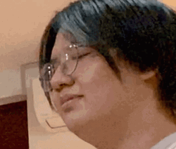 Man Slapping Face By A Fish GIF