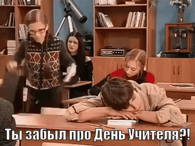 Man Sleeping at Desk in Classroom
