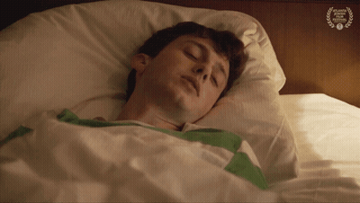 Man Sleeping In Bed With Atlanta Film Festival Laurel GIF