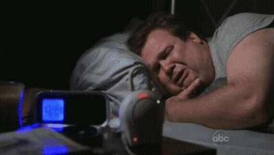 Man Sleeping Next To Alarm Clock GIF