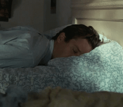 Man Sleeping On Bed With Blue Comforter GIF