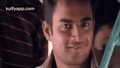 Man Smiling At Camera On Bus GIF