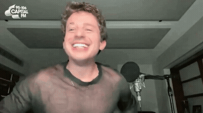 Man Smiling At Microphone 95-106 Capital FM GIF