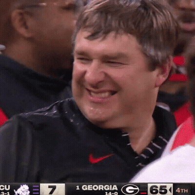 Man Smiling At Scoreboard 1 Georgia G 65 4Th GIF