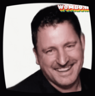 Man Smiling At Screen Saying Wombo N GIF