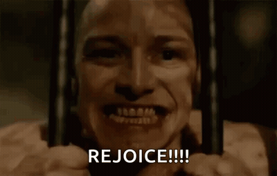 Man Smiling Behind Bars In Prison Cell GIF