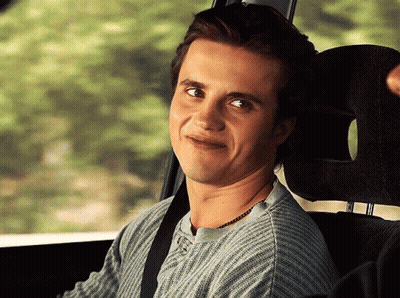 Man Smiling In Back Seat GIF