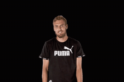 Man Smiling In Black Puma T-Shirt GIF