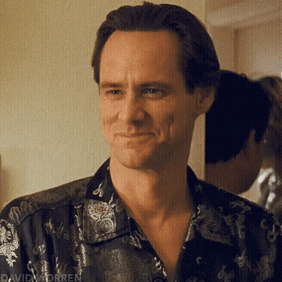 Man Smiling In Black Shirt With Dragons GIF