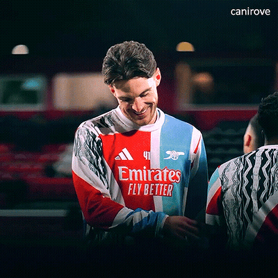 Man Smiling In Emirates Fly Better Jersey GIF