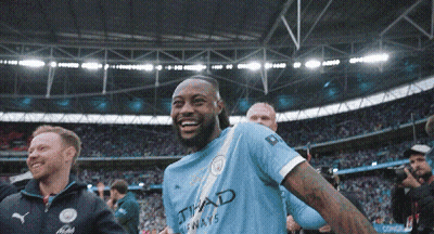 Man Smiling In Etihad Airways Shirt GIF