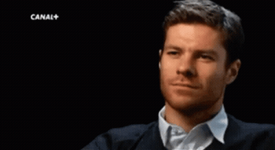 Man Smiling In Front Of Canal+ GIF