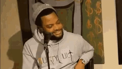 Man Smiling In Front Of Microphone GIF
