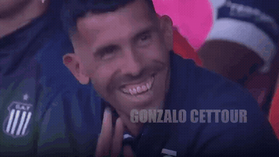 Man Smiling In Front Of Punto Inteligente Sign GIF