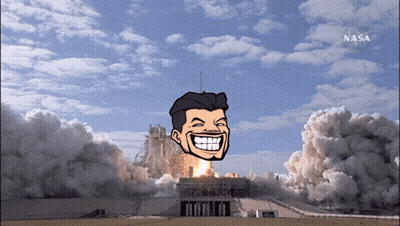 Man Smiling In Front Of Rocket Launch With NASA GIF