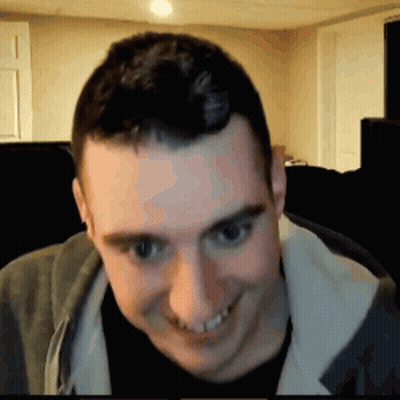 Man Smiling In Grey Jacket GIF