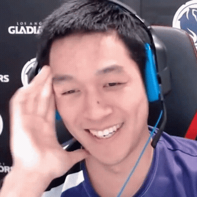 Man Smiling In Headphones At Los Angeles Gladiators Sign GIF