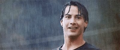 Man Smiling In Rain With Wet Hair GIF