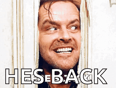 Man Smiling Looking Through Door Hes Back GIF