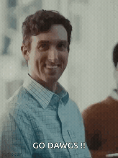 Man Smiling Saying Go Dawgs GIF