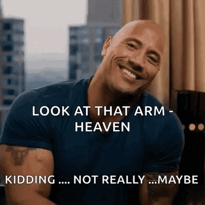 Man Smiling Saying Look At That Arm GIF
