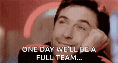 Man Smiling Saying One Day We'll Be A Full Team GIF