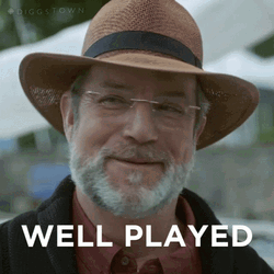 Man Smiling Saying Well Played GIF