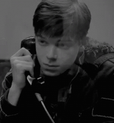 Man Smiling Talking On Phone GIF